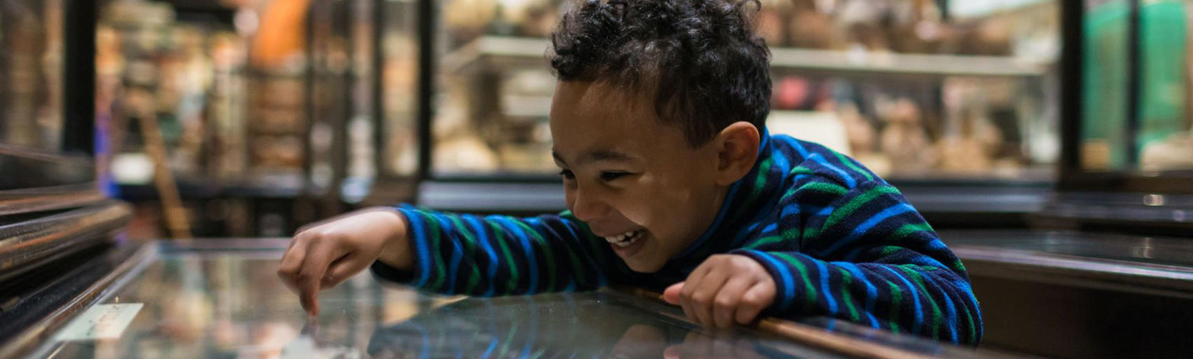 Child at the Pitt Rivers Museum