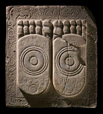 Foot of the Buddha, dome-slab sculpture carved on the front with Buddhapada (foootprints of the Buddha), each foot bearing a dharmacakra (wheel of the law) and lotuses