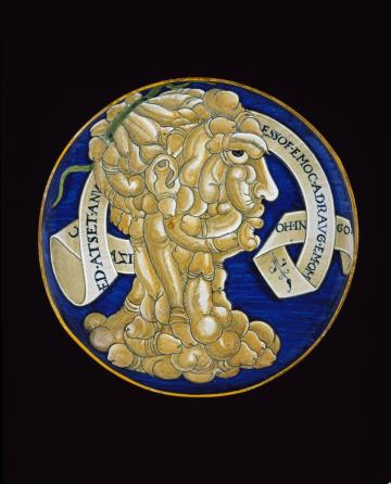 Maiolica dish with a composite head of penises Dish with a composite head of penises